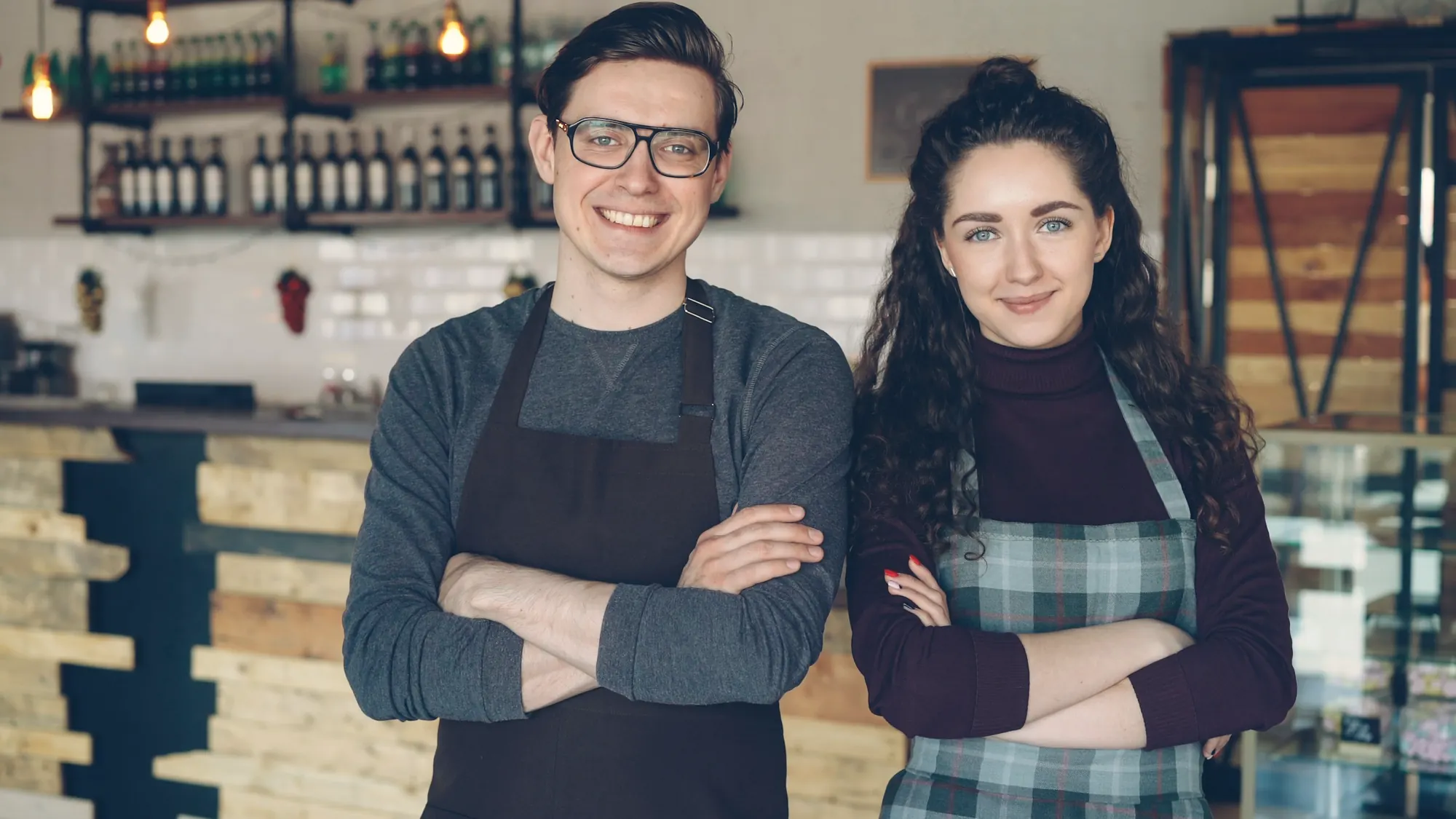 Two cafe owners in their shop